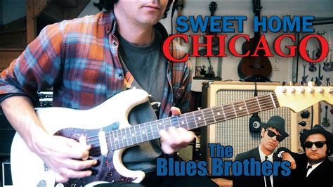  Sweet Home Chicago - Een bluesklassieker die de ziel van een stad gevangen houdt met zijn krachtige slide gitaar en rouwvolle vocalen